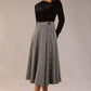 model is wearing a diva catwalk Velana Soft-Touch Check Midi Skirt wrap a-line design in misty grey check