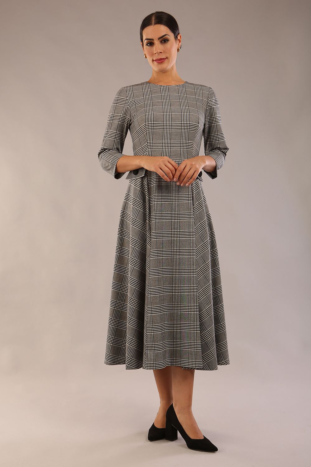 model is wearing a diva catwalk Elanore Soft-Touch Check A-Line Dress with round neckline and 3/4 sleeves midi length and faux pocket with button details in misty grey check colour