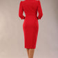 model is wearing a diva catwalk Quintessa Three Petal Keyhole Pencil Dress with 3/4 sleeves round neckline a below the knee length in red colour