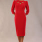 model is wearing a diva catwalk Quintessa Three Petal Keyhole Pencil Dress with 3/4 sleeves round neckline a below the knee length in red colour