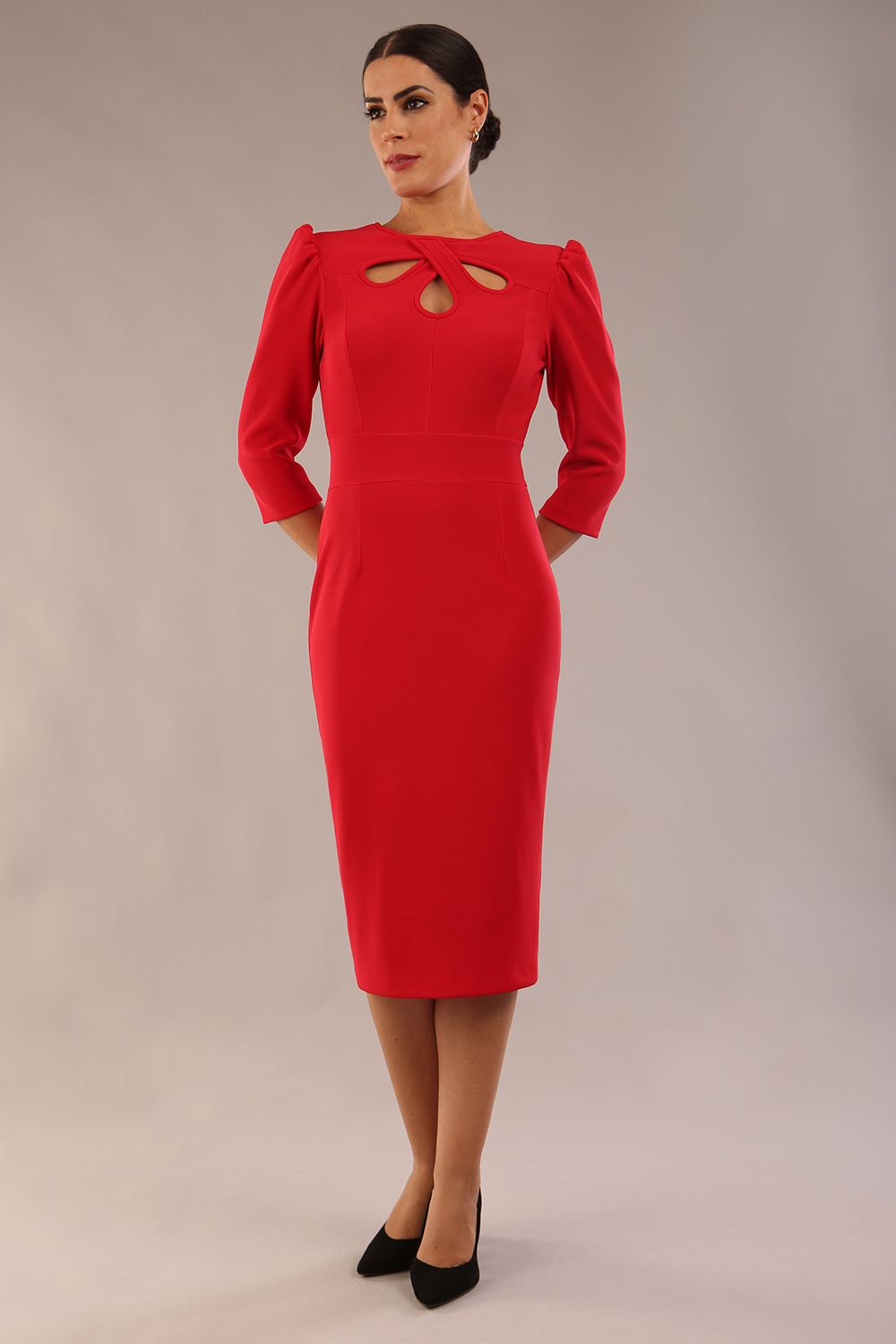 model is wearing a diva catwalk Quintessa Three Petal Keyhole Pencil Dress with 3/4 sleeves round neckline a below the knee length in red colour