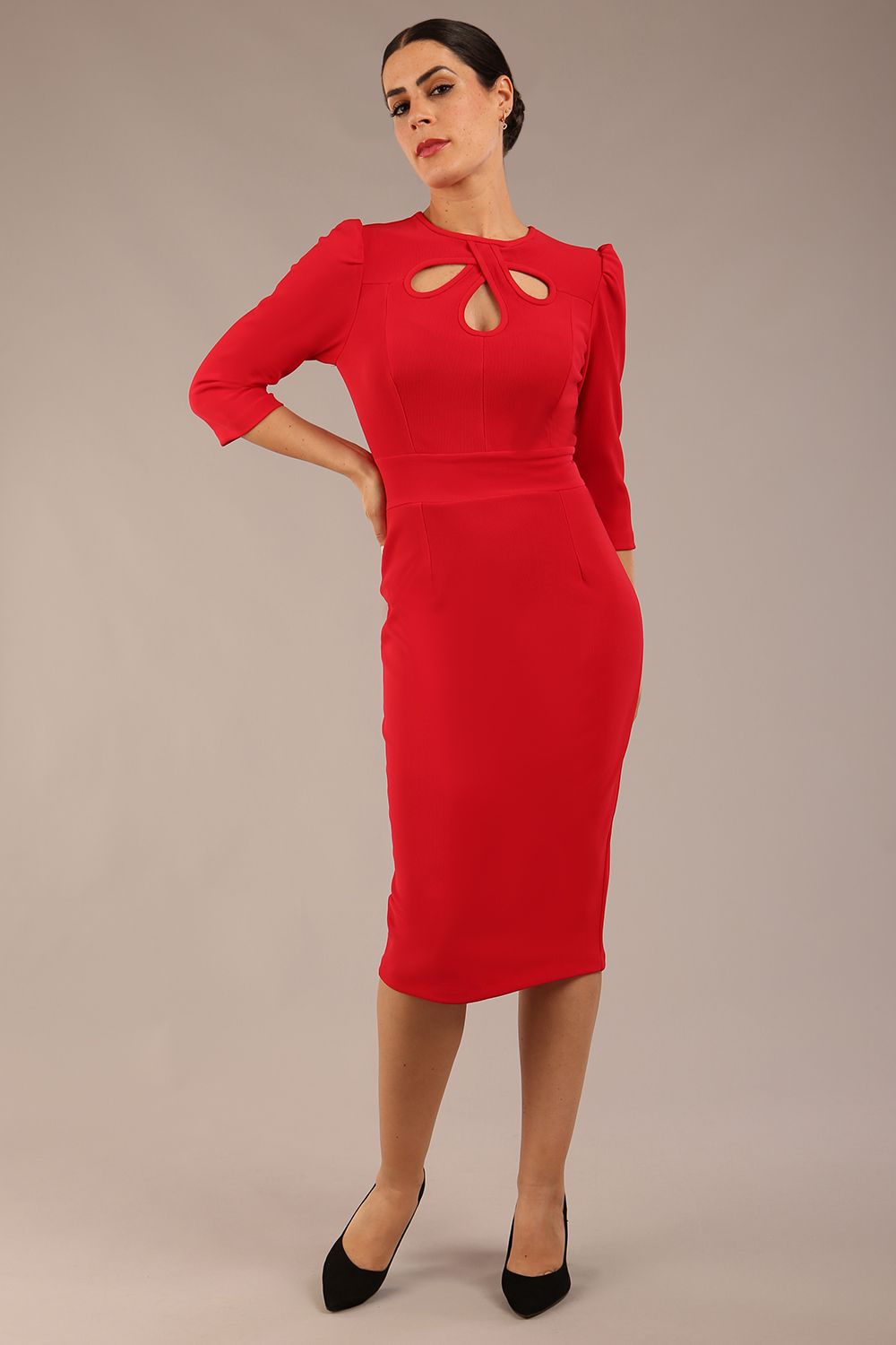 model is wearing a diva catwalk Quintessa Three Petal Keyhole Pencil Dress with 3/4 sleeves round neckline a below the knee length in red colour