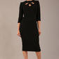 model is wearing a diva catwalk Quintessa Three Petal Keyhole Pencil Dress with 3/4 sleeves round neckline a below the knee length in black colour