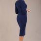 model is wearing a diva catwalk Quintessa Three Petal Keyhole Pencil Dress with 3/4 sleeves round neckline a below the knee length in navy blue colour