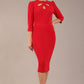 model is wearing a diva catwalk Quintessa Three Petal Keyhole Pencil Dress with 3/4 sleeves round neckline a below the knee length in red colour