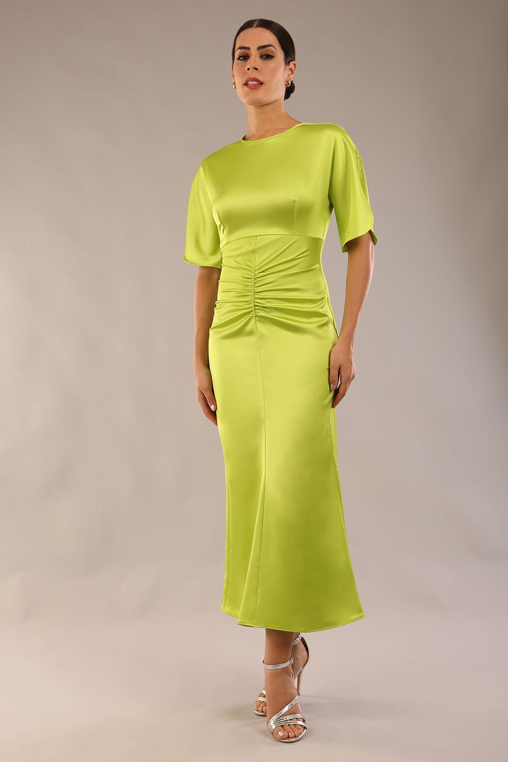 model is wearing a diva catwalk Gathered Waist Midi Dress with round neckline, short split sleeves with gathered central detail and midi length in lime green colour