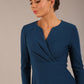 brunette model is wearing a diva catwalk Haddington sleeved A-line Dress knee length round neckline with crossover v-slit detail in teal colour front image