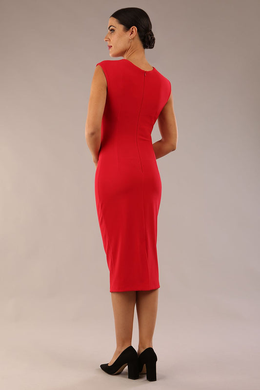 model is wearing a diva catwalk sleeveless dress with round neckline with pleating details and knee length in true red colour back