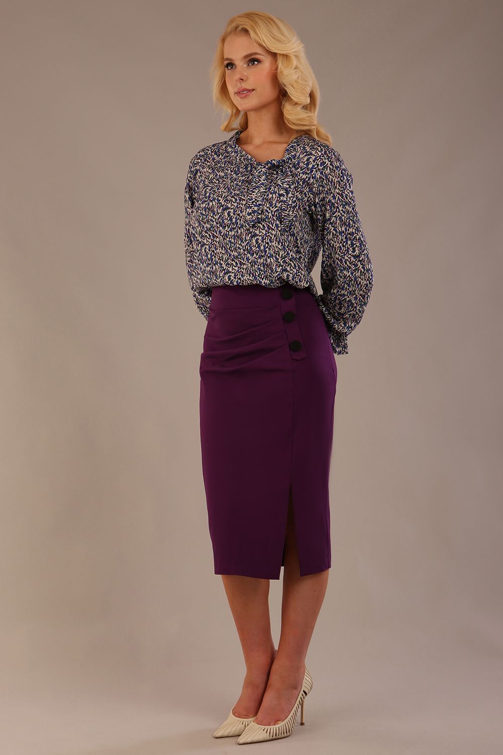  Close-up of the elasticated frill cuff detail on the sleeve of the Alpha top