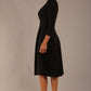 brunette model is wearing a diva catwalk Haddington sleeved A-line Dress knee length round neckline with crossover v-slit detail in black colour back image 