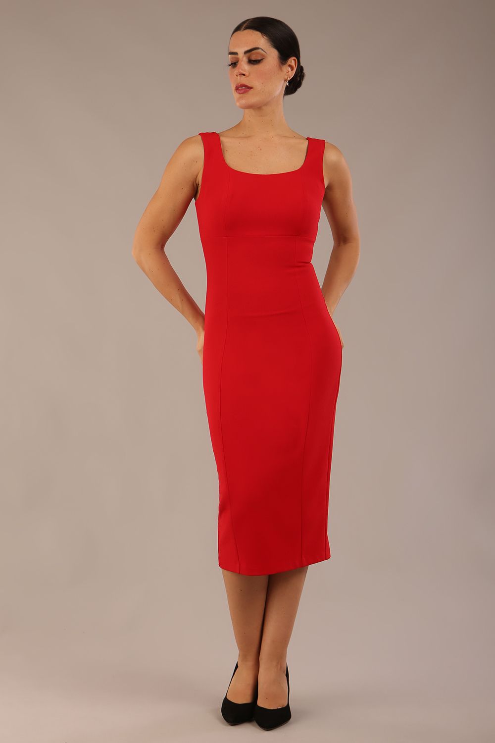 brunette model is wearing a diva catwalk Perthshire Sleeveless Bodycon Pencil Dress square neckline in passion red colour front image 