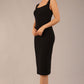brunette model is wearing a diva catwalk Perthshire Sleeveless Bodycon Pencil Dress square neckline in black colour front image 