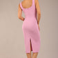 brunette model is wearing a diva catwalk Perthshire Sleeveless Bodycon Pencil Dress square neckline in dawn pink colour back image 
