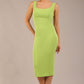 brunette model is wearing a diva catwalk Perthshire Sleeveless Bodycon Pencil Dress square neckline in lime green colour front image 