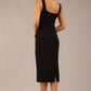 brunette model is wearing a diva catwalk Perthshire Sleeveless Bodycon Pencil Dress square neckline in black colour back image 