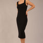 brunette model is wearing a diva catwalk Perthshire Sleeveless Bodycon Pencil Dress square neckline in black colour front image 