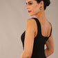 brunette model is wearing a diva catwalk Perthshire Sleeveless Bodycon Pencil Dress square neckline in black colour back image 