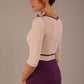 brunette model is wearing a diva catwalk Cherie Sleeved Contrast Bow Neck Pencil Dress round neckline  in Purple and Pink Haze back close up image