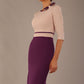 brunette model is wearing a diva catwalk Cherie Sleeved Contrast Bow Neck Pencil Dress round neckline  in Purple and Pink Haze front image