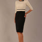 brunette model is wearing a diva catwalk Cherie Sleeved Contrast Bow Neck Pencil Dress round neckline  in Black and Stone front image