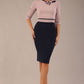 brunette model is wearing a diva catwalk Cherie Sleeved Contrast Bow Neck Pencil Dress round neckline  in Navy Blue-Thunderbird front image