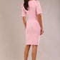 brunette model is wearing a diva catwalk Reverie Short Sleeve Stretch Pencil Dress with Bow Detail in crystal pink colour back image 