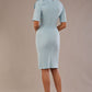 brunette model is wearing a diva catwalk Reverie Short Sleeve Stretch Pencil Dress with Bow Detail in sky blue colour back image 
