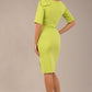 brunette model is wearing a diva catwalk Reverie Short Sleeve Stretch Pencil Dress with Bow Detail in lime green colour back image