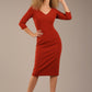 blonde model is wearing a  diva catwalk Tara V-neckline Sleeved Pencil Dress knee length in terracotta brown colour front image (Terracotta)