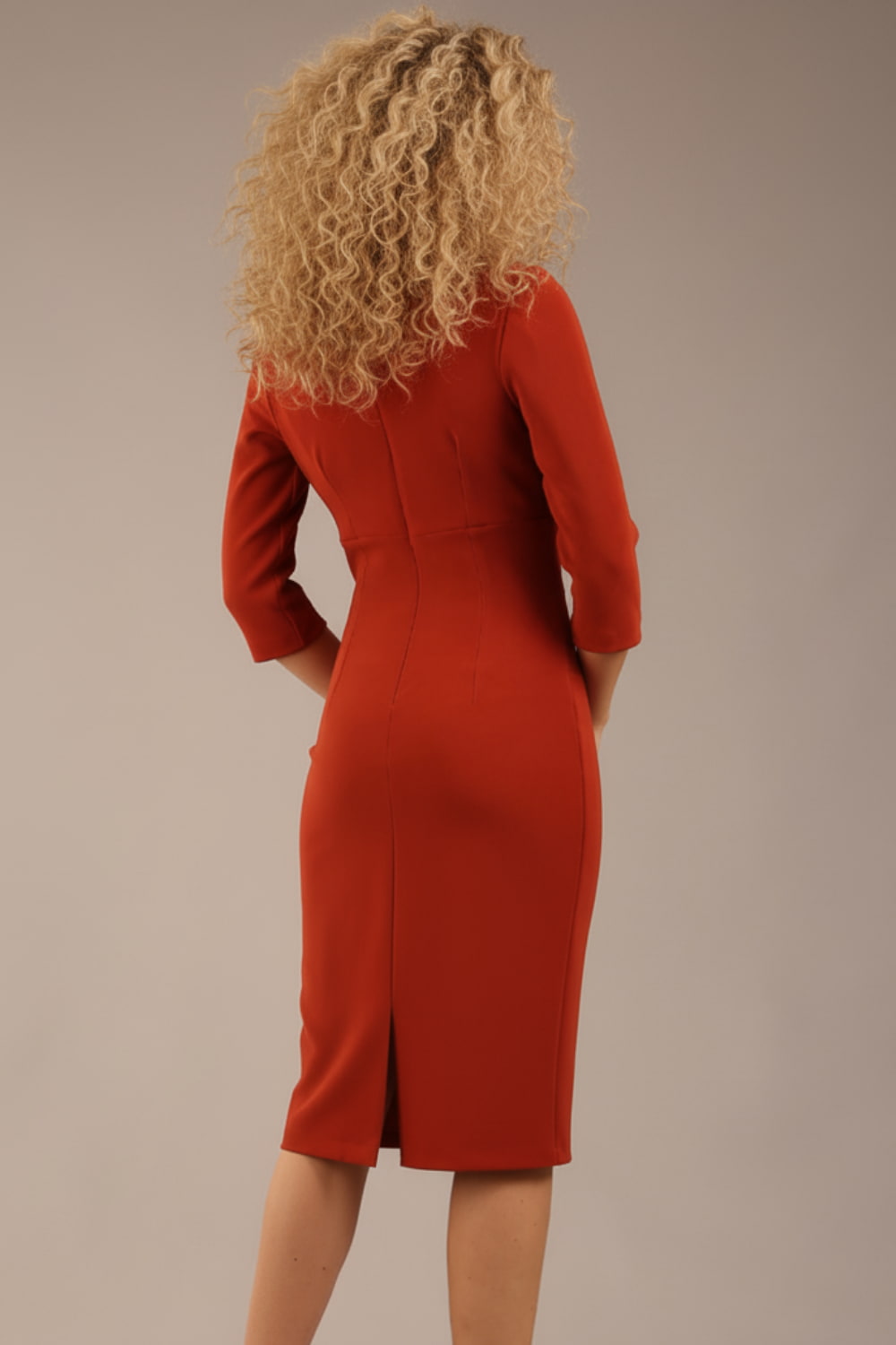 blonde model is wearing a  diva catwalk Tara V-neckline Sleeved Pencil Dress knee length in terracotta brown colour front image (Terracotta) back image