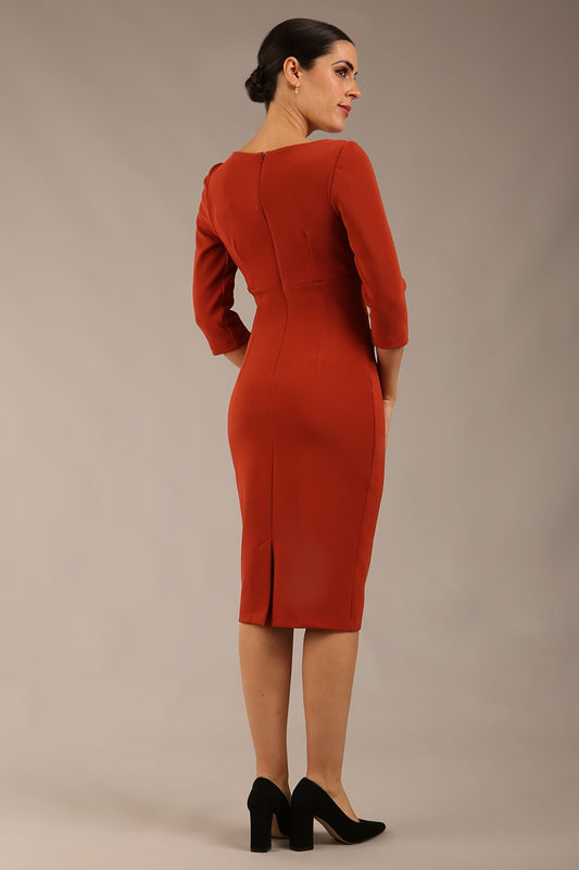 brunette model is wearing a  diva catwalk Tara V-neckline Sleeved Pencil Dress knee length in terracotta brown colour back image 