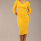 brunette model is wearing a  diva catwalk Tara V-neckline Sleeved Pencil Dress knee length in sunshine yellow colour front image 