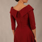 brunette model is wearing a diva catwalk Fabienne sleeved A-line Dress with pockets v neckline knee length wide waistband fold over v neckline in burgundy colour back image