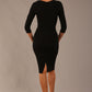 brunette model is wearing a diva catwalk Mirabelle ¾ Sleeves & Floral Shoulder Detail Pencil Dress with diagonal pleating across the front knee length in black colour back image
