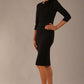 brunette model is wearing a diva catwalk Mirabelle ¾ Sleeves & Floral Shoulder Detail Pencil Dress with diagonal pleating across the front knee length in black colour front image