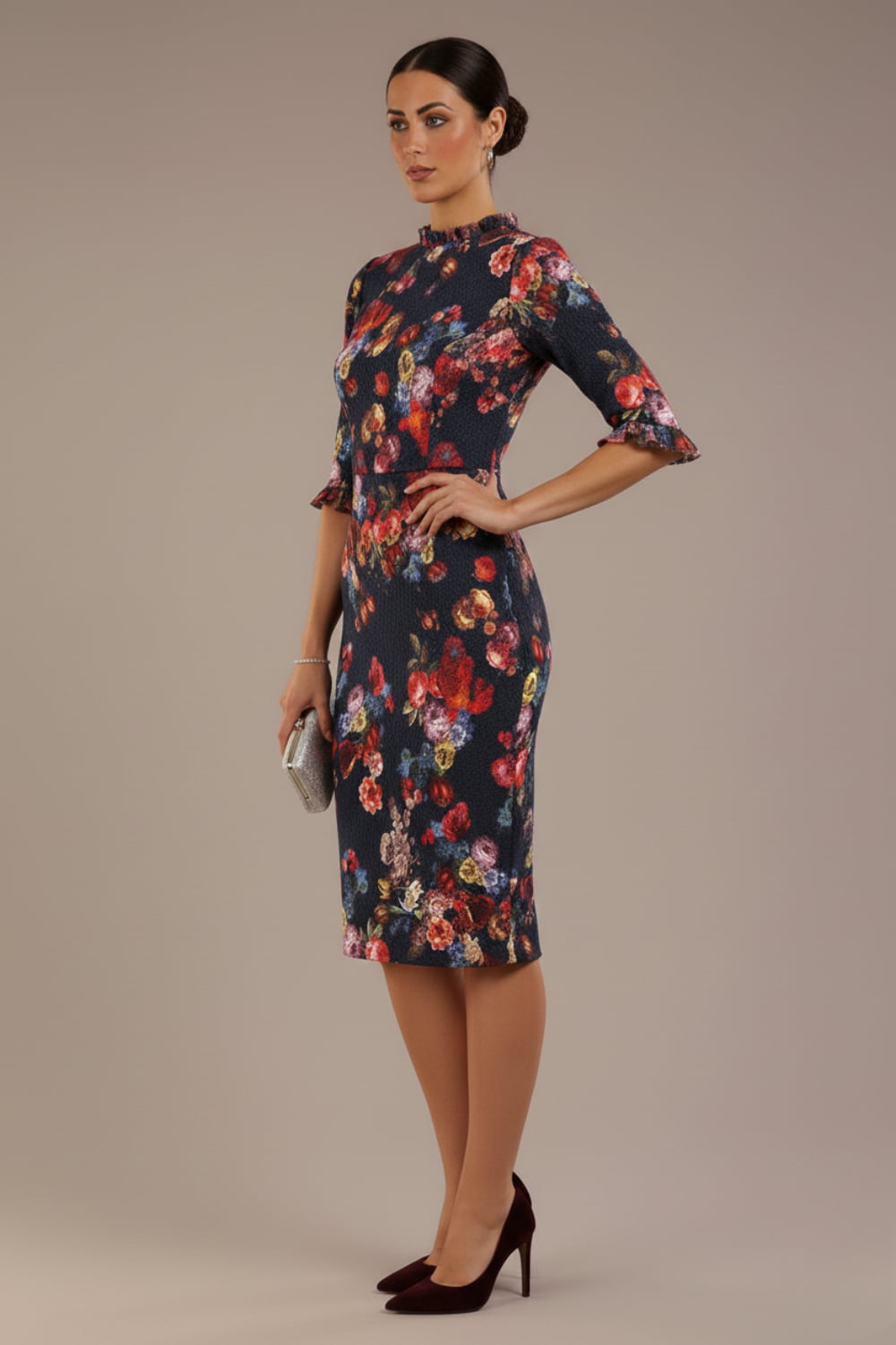 Model wearing the Portofino frill neck floral jacquard dress against a plain background (Hidcote Floral)