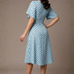 brunette model is wearing a diva catwalk Anastasia Polka Dot Bell Sleeves & A-Line Skirt Midi Dress a-line dress in sky blue polka dot back image (Sky Blue Polka Dot)