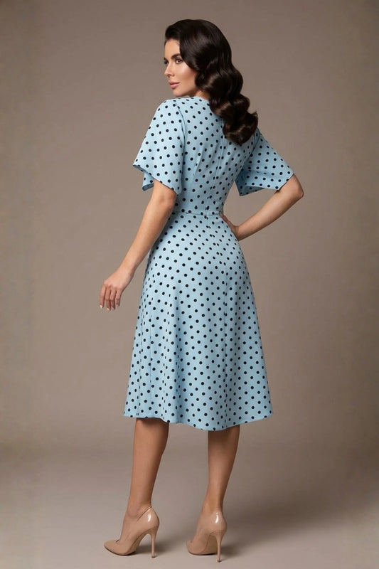 brunette model is wearing a diva catwalk Anastasia Polka Dot Bell Sleeves & A-Line Skirt Midi Dress a-line dress in sky blue polka dot back image (Sky Blue Polka Dot)