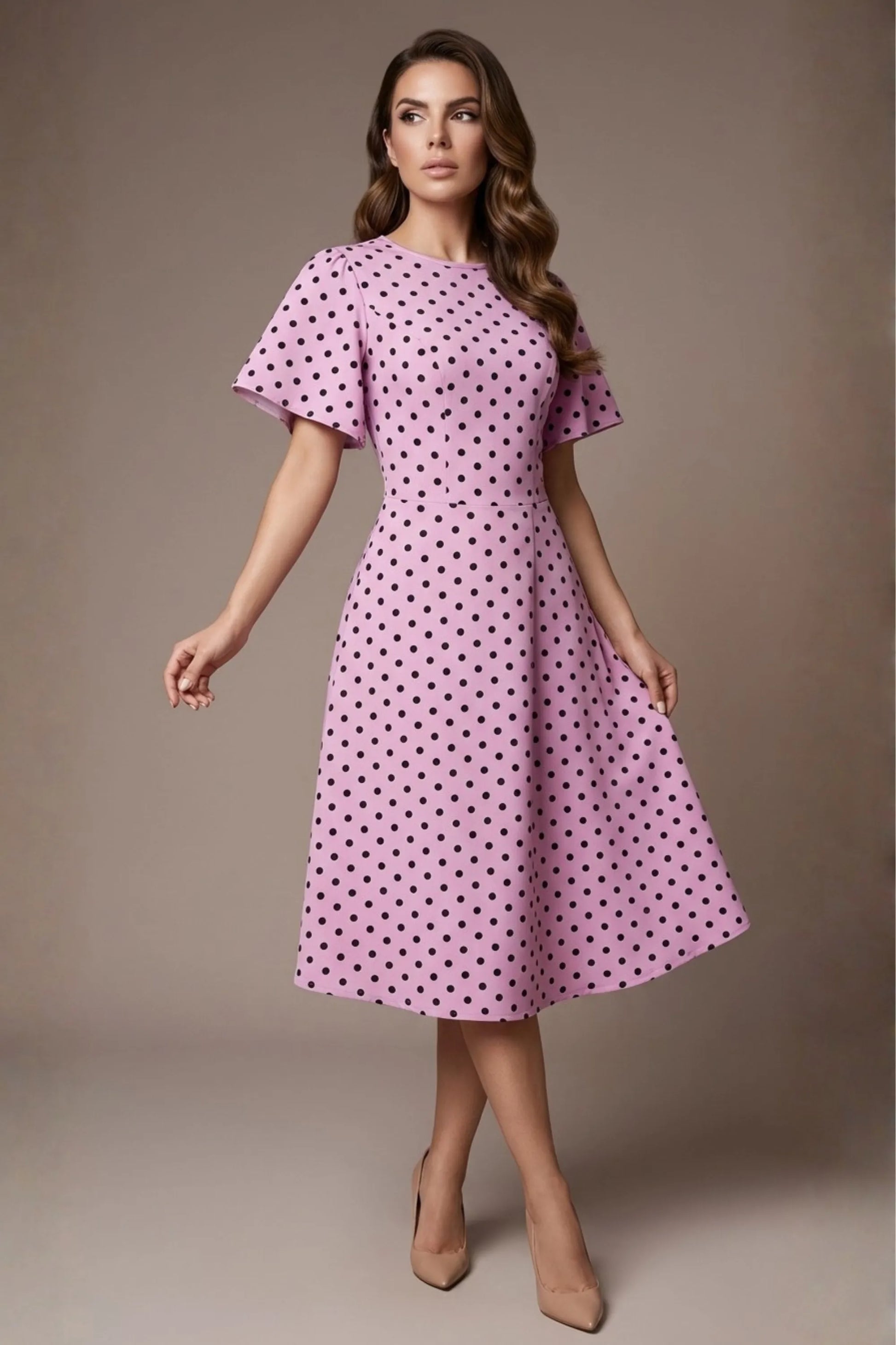 brunette model is wearing a diva catwalk Anastasia Polka Dot Bell Sleeves & A-Line Skirt Midi Dress a-line dress in orchid polka dot front image (Orchid Polka Dot)
