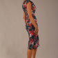 back view Model wearing the Nora asymmetric floral jacquard dress, showcasing the unique draped neckline (Hidcote Floral)