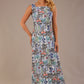 blonde model is wearing a 7000 diva catwalk Glyndebourne Sleeveless Square Neck Maxi Dress in Water Garden print with pockets front