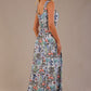 blonde model is wearing a 7000 diva catwalk Glyndebourne Sleeveless Square Neck Maxi Dress in Water Garden print with pockets back