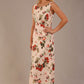 blonde model is wearing a 7000 diva catwalk Glyndebourne Sleeveless Square Neck Maxi Dress in Rose Blush print with pockets front
