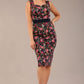 brunette model is wearing a diva catwalk June Floral Sleeveless Navy Waistband Pencil Dress in Navy Spring Rose front image