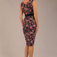 brunette model is wearing a diva catwalk June Floral Sleeveless Navy Waistband Pencil Dress in Navy Spring Rose back image