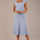brunette model is wearing a diva catwalk Sonning Cap Sleeve Square Neckline A-Line midi Dress and rushing side details in powder blue colour front