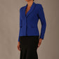 Model wearing the Melberry tailored jacket in royal blue, showing the sculpted waist and statement lapel detail (Royal Blue)