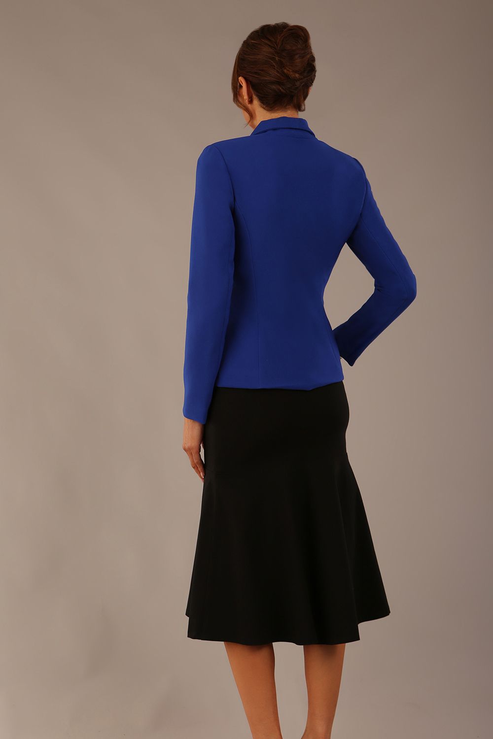 Back view of the Melberry tailored jacket in royal blue, highlighting the panelled seams and fitted silhouette.