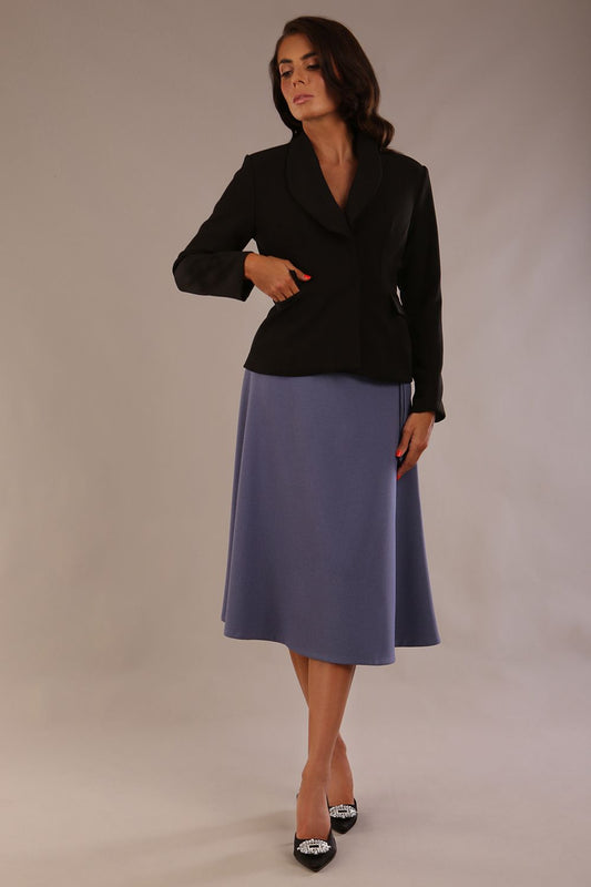 Close-up front view of the Melberry statement jacket in black, showing the flap pocket and fabric-covered buttons (Black)