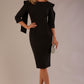 Model wearing the Rio statement collar pencil dress in black, showcasing its architectural silhouette.